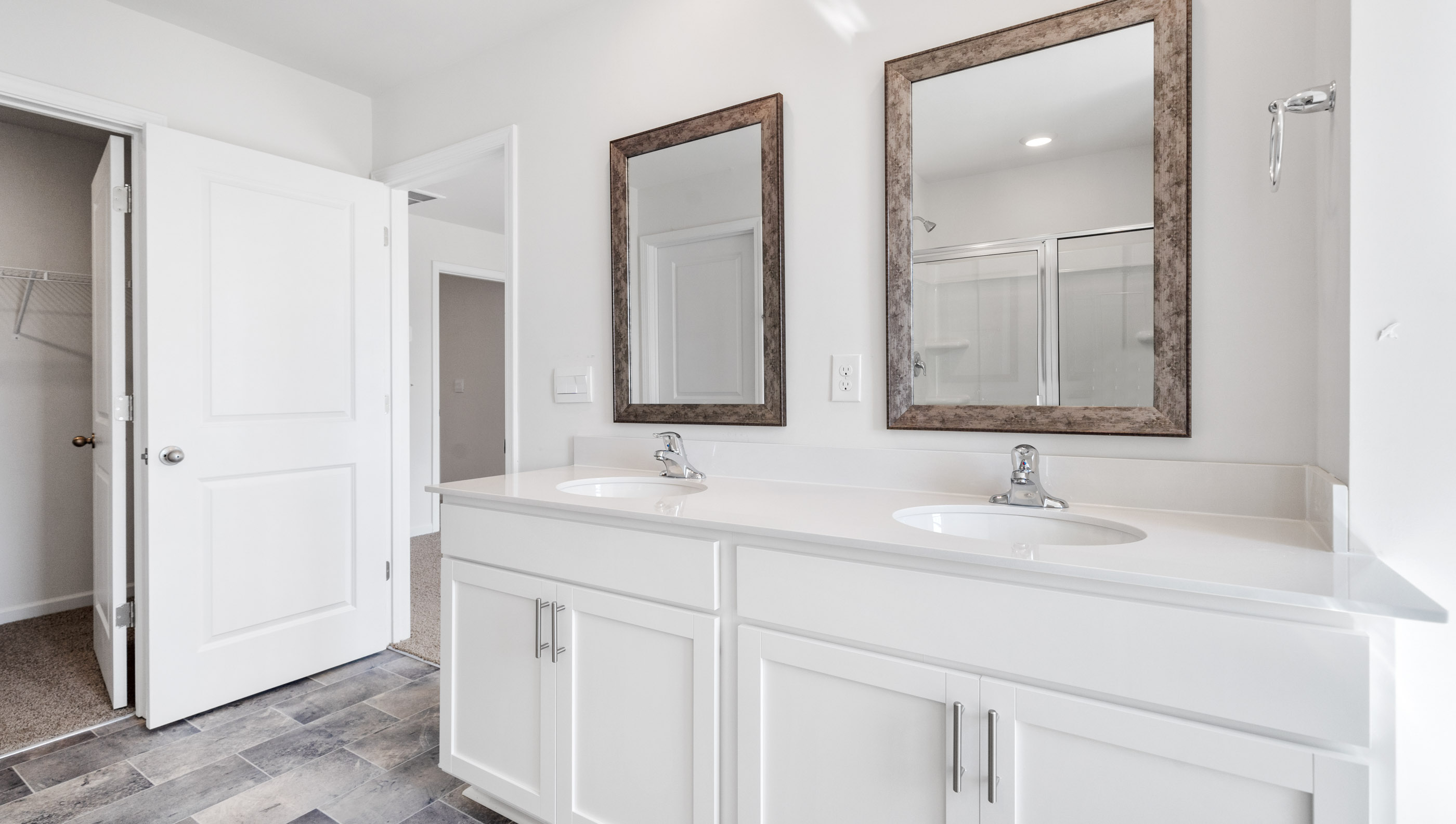 Bathroom with dual vanity.