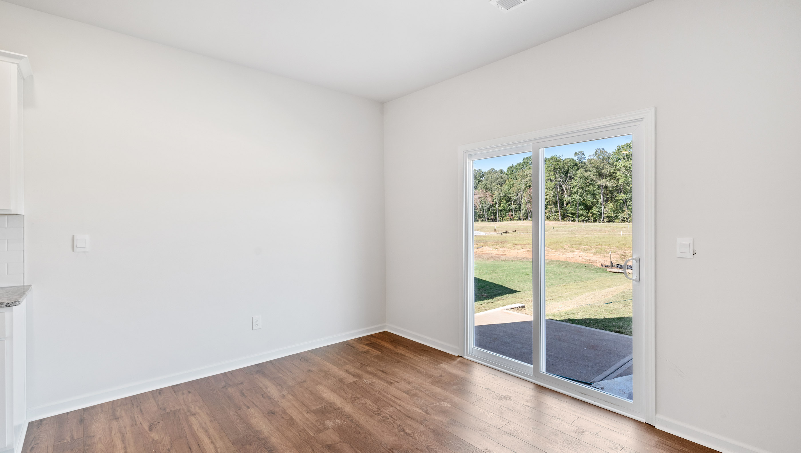 Dining room with sliding doors.