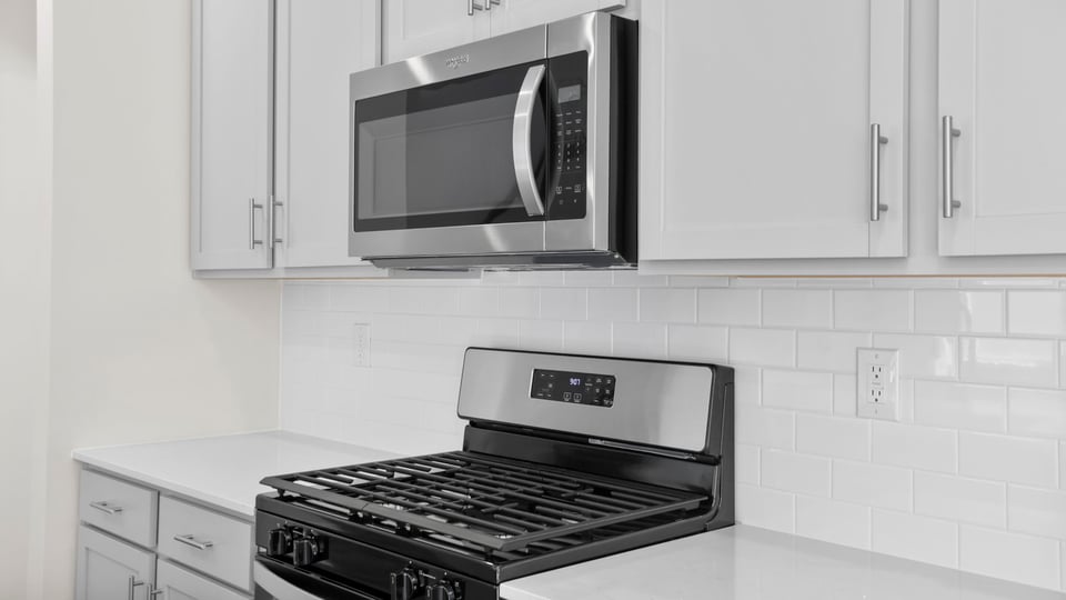 Kitchen with stainless steel appliances.