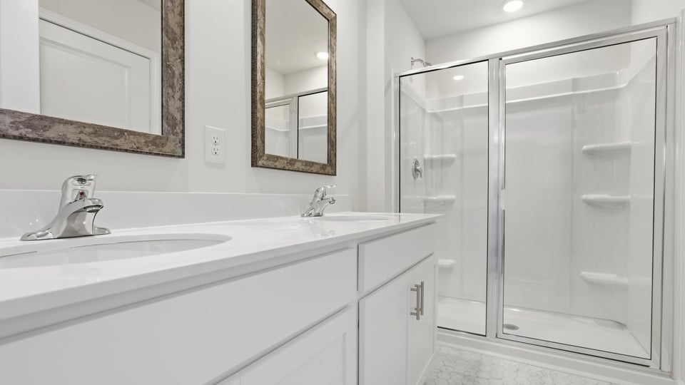 Bathroom with walk in shower.
