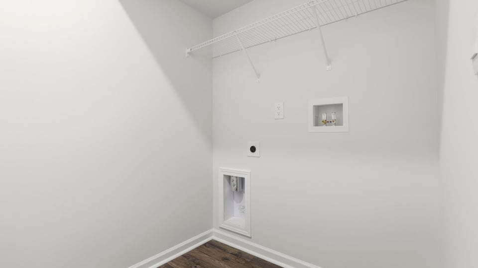 Laundry room with hanging storage hanging racks.