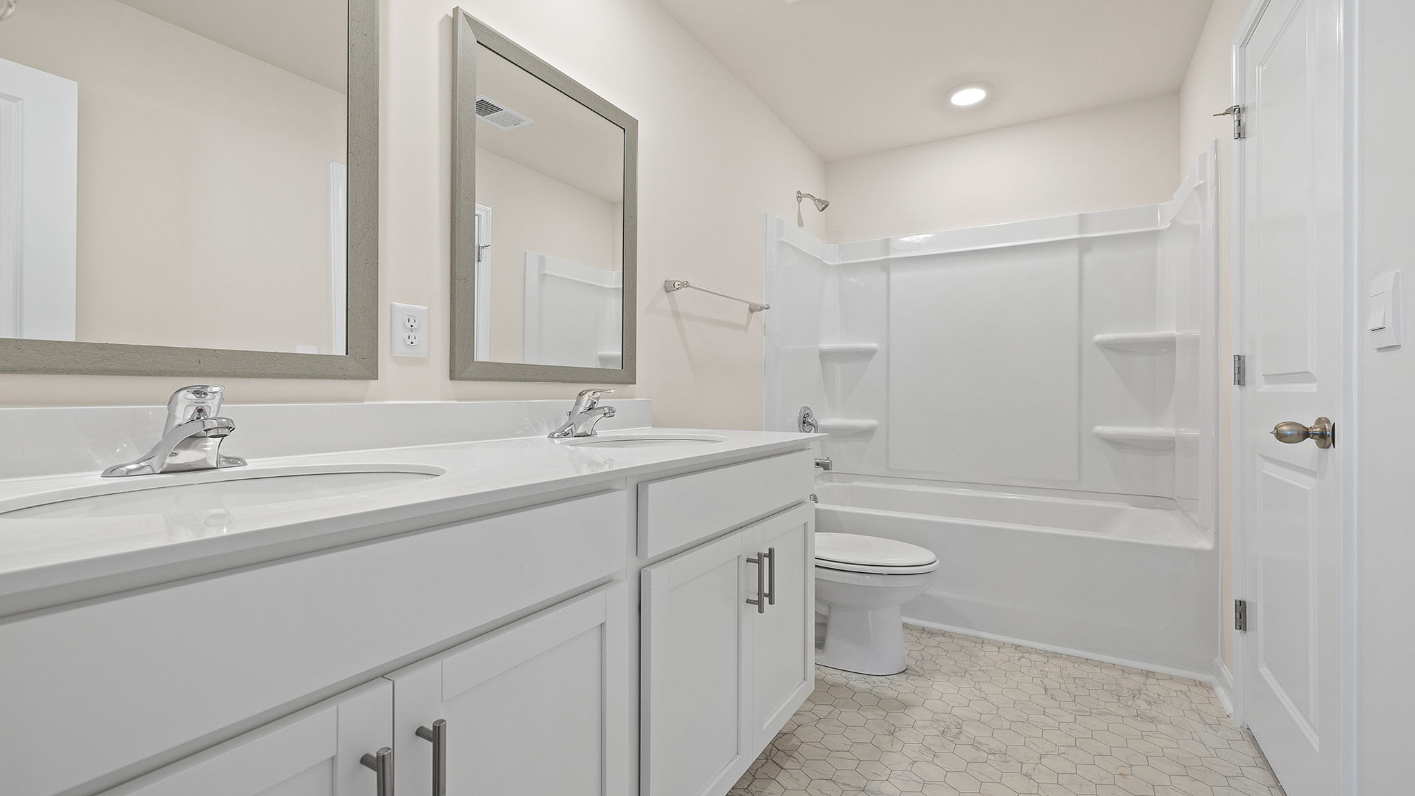 Bathroom with vanity and tub.
