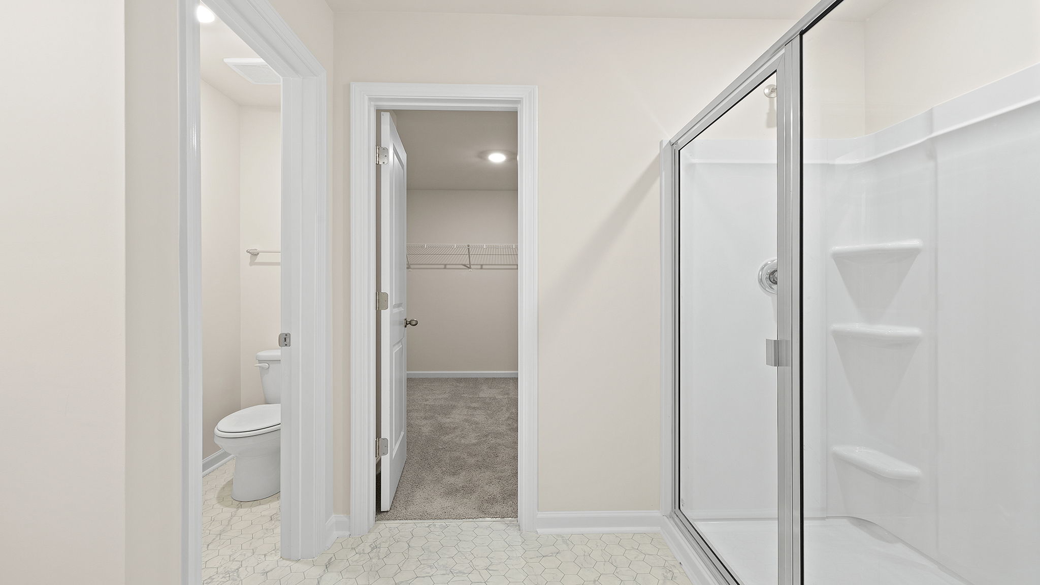 Bathroom with walk in shower.