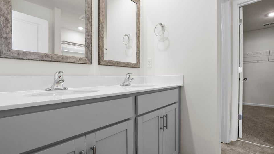 Bathroom with dual vanity.