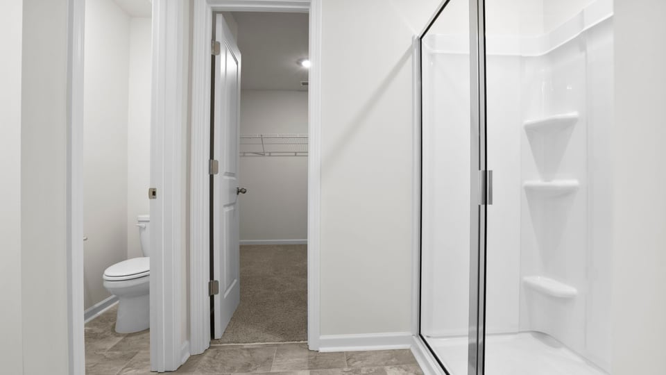 Bathroom with walk in shower.