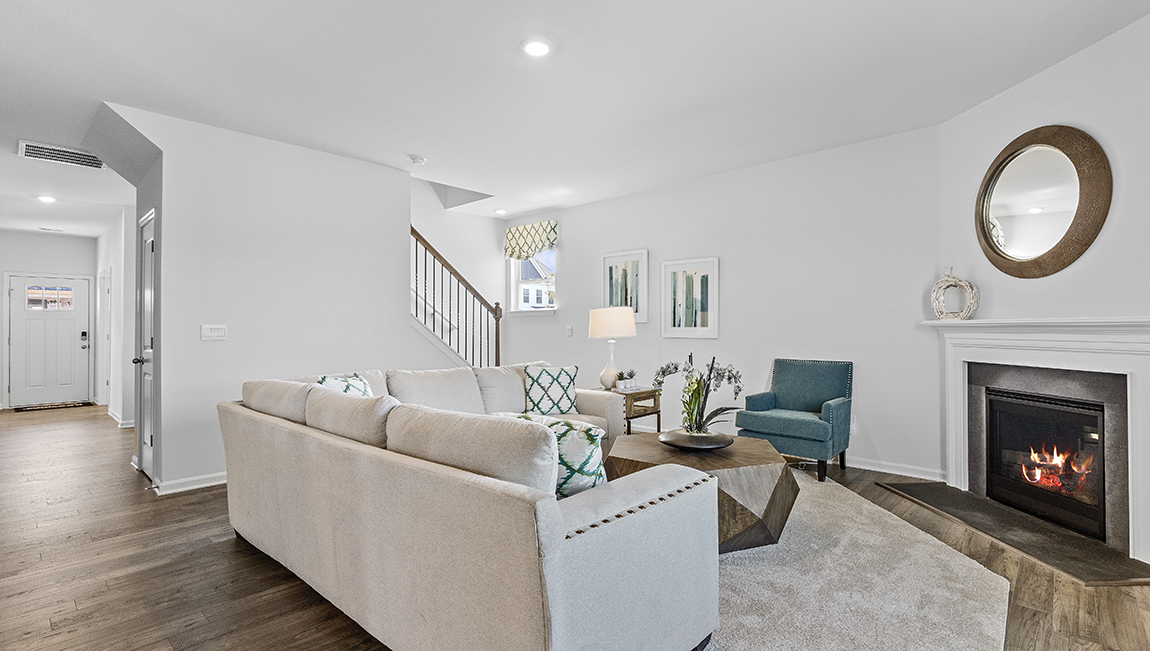 Livingroom with firplace and window.