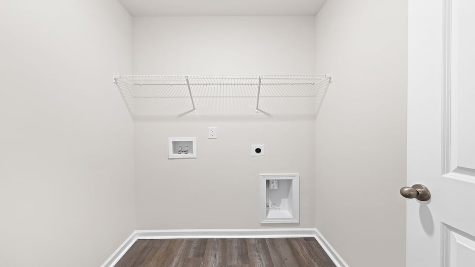 Walk-in laundry room.