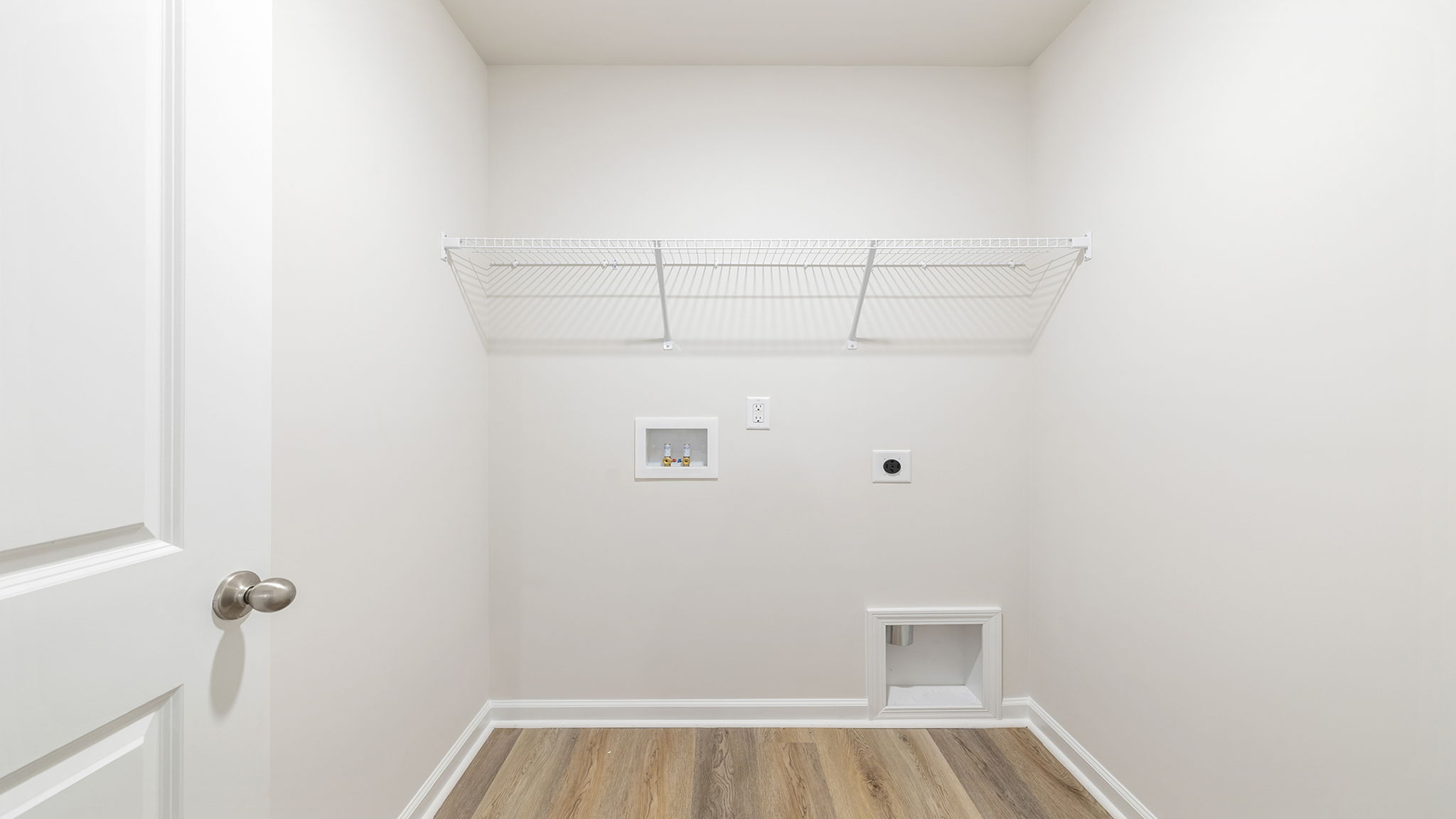 Walk-in laundry room.