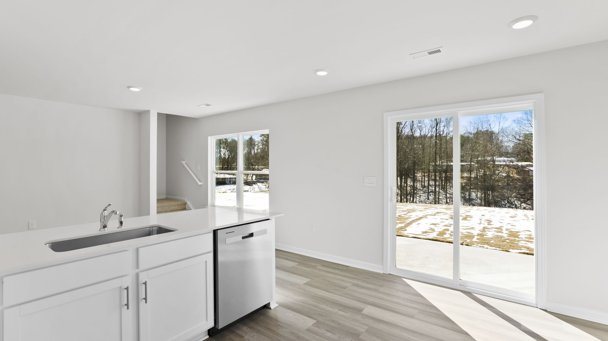 View of the door to the back yard off kitchen.