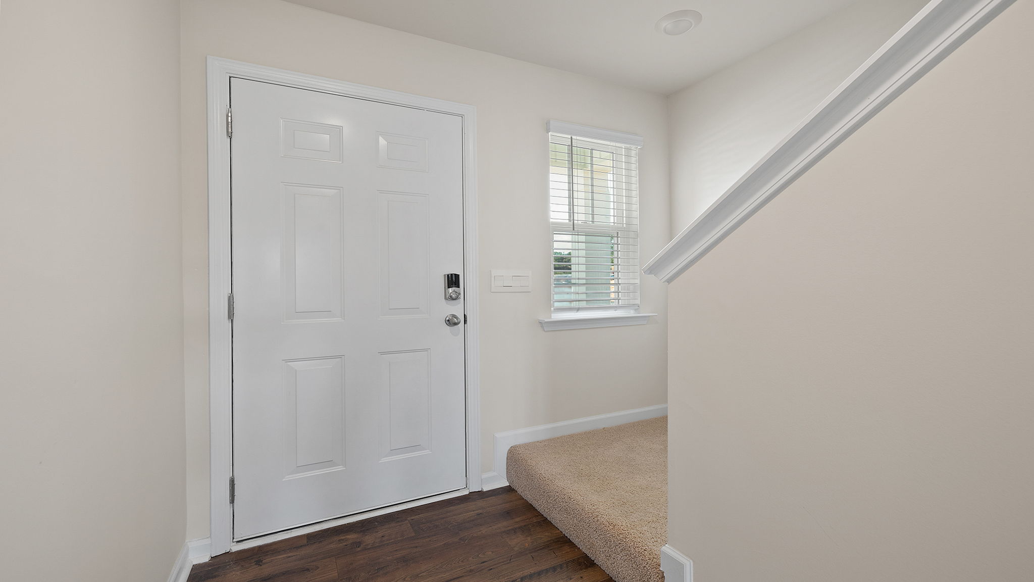 Entrance and view of stairwell placement.
