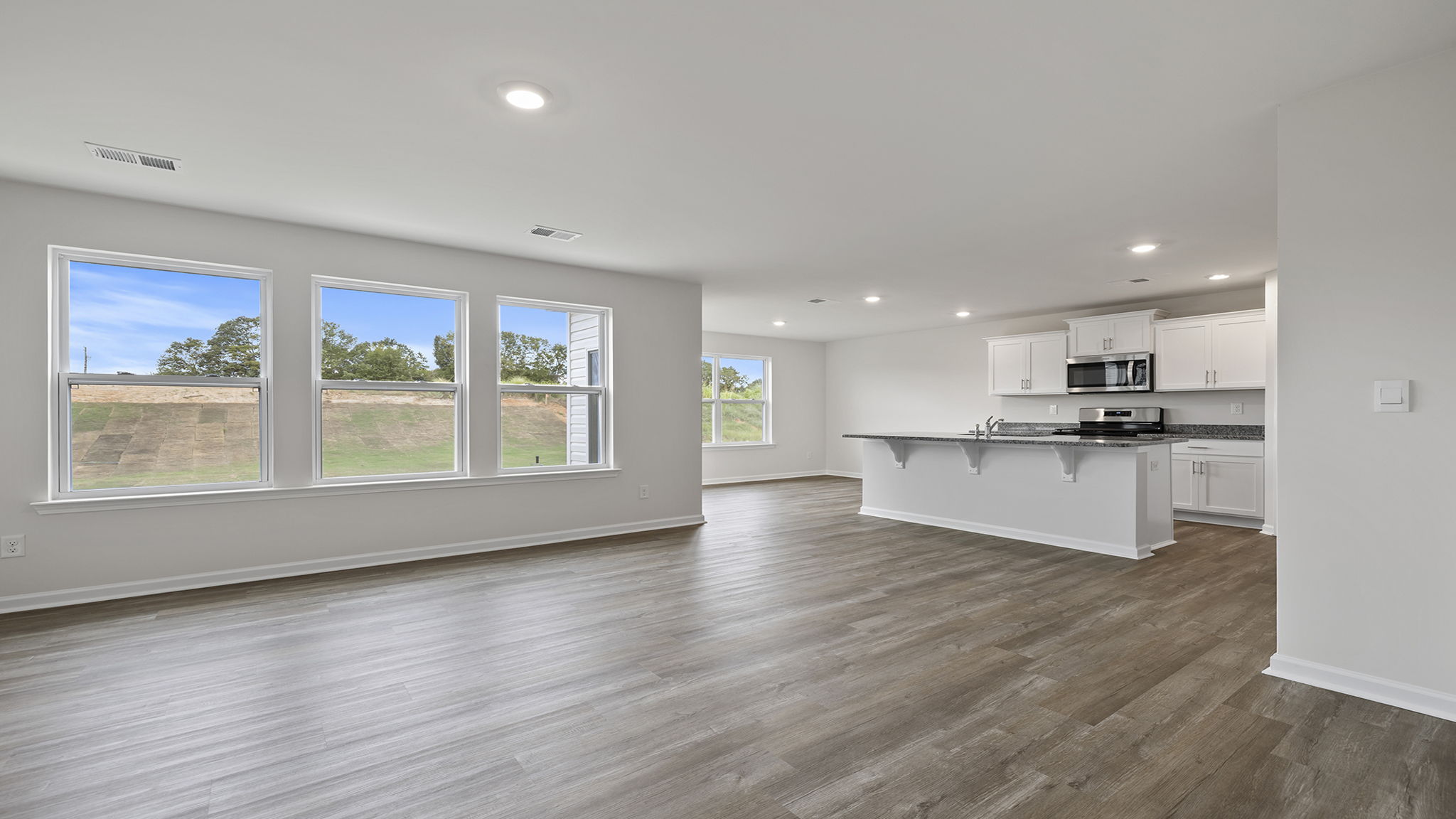 View of open floorplan with lots of windows.