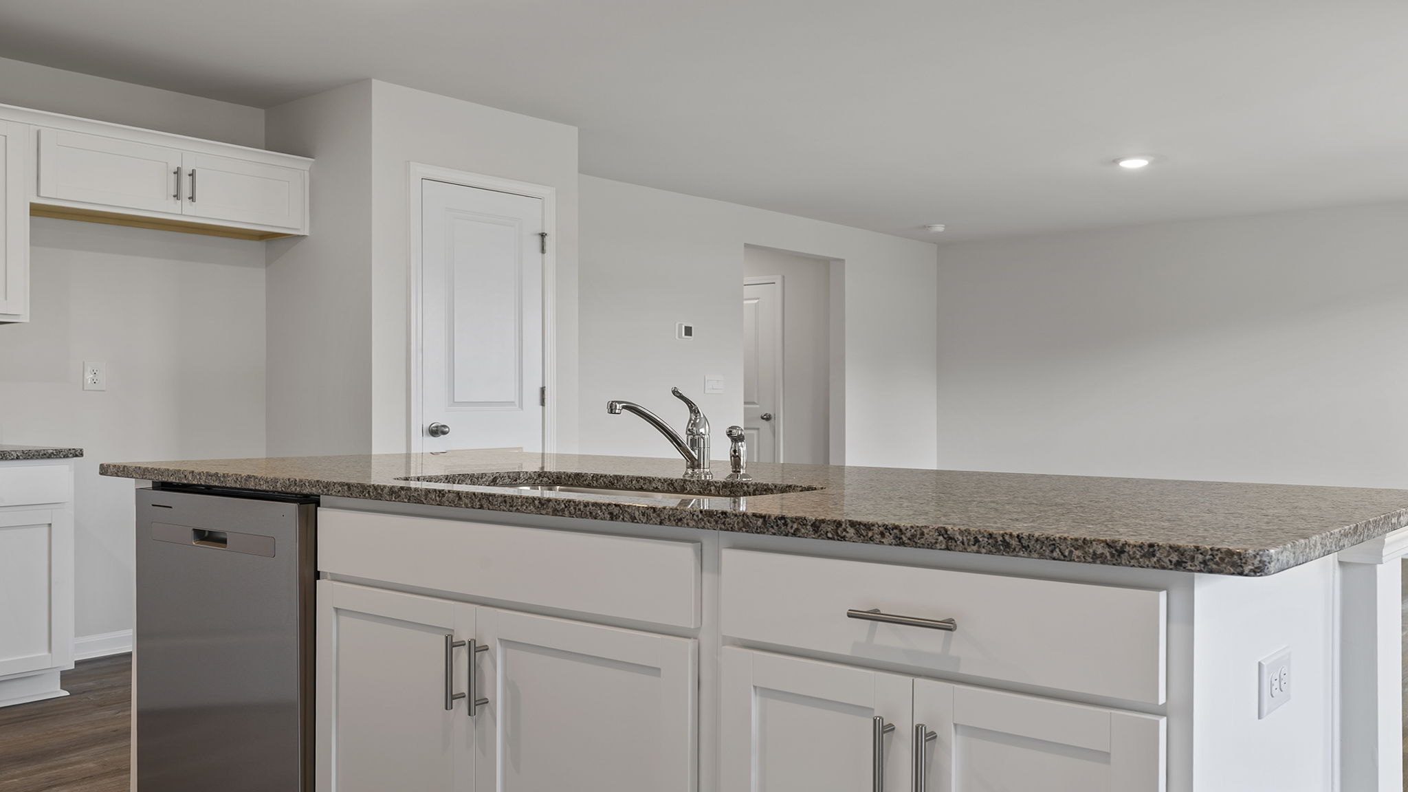 Island with sink and diswasher.