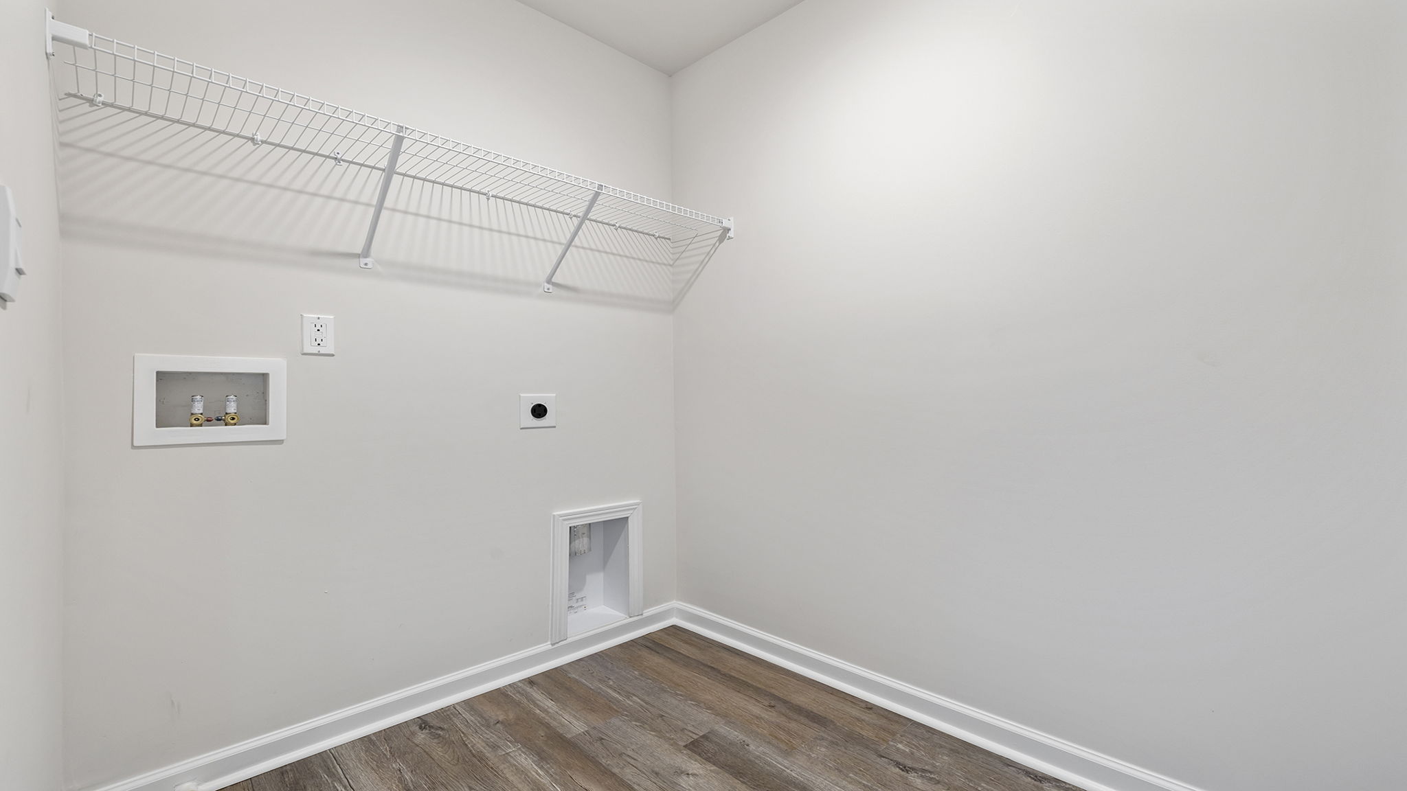 Walk-in laundry room.