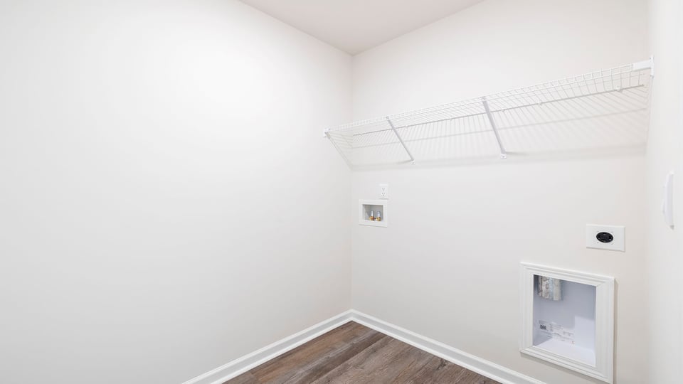 Walk-in laundry room.