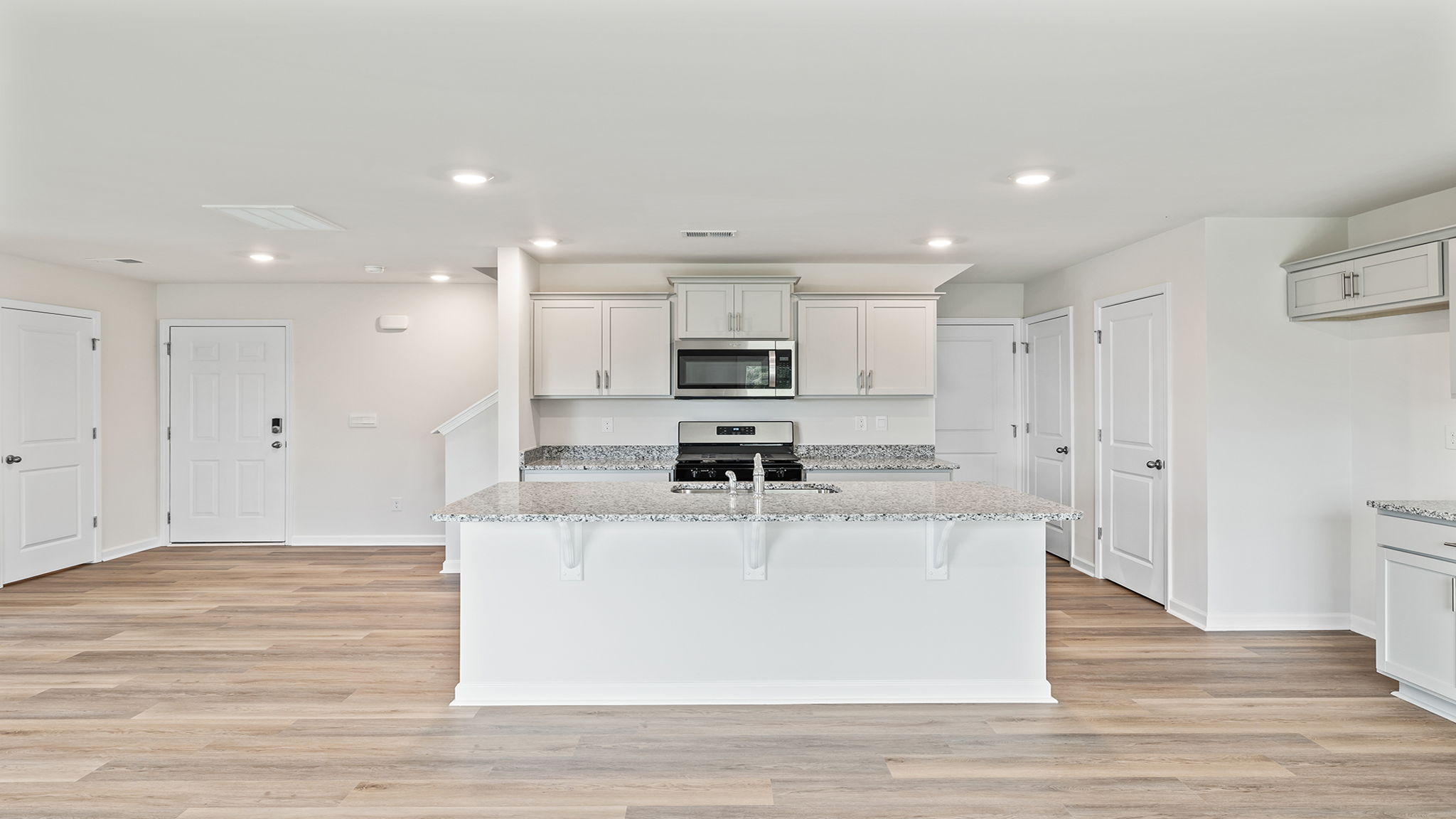 Island can hosts bar stools for added enjoyment.