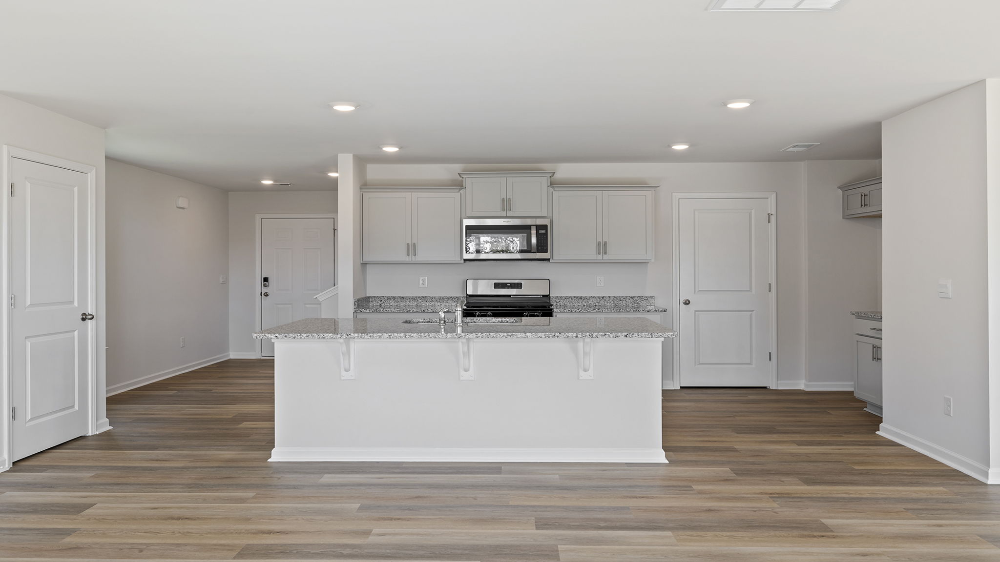 View of kitchen with island.