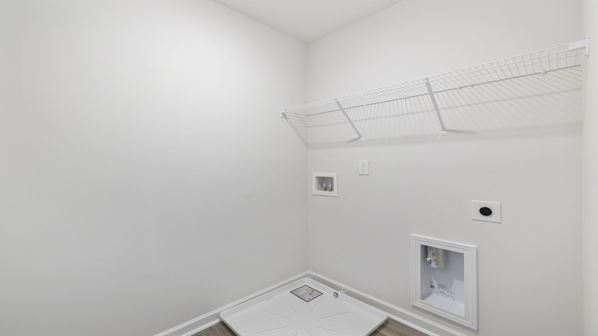 Walk-in laundry room.