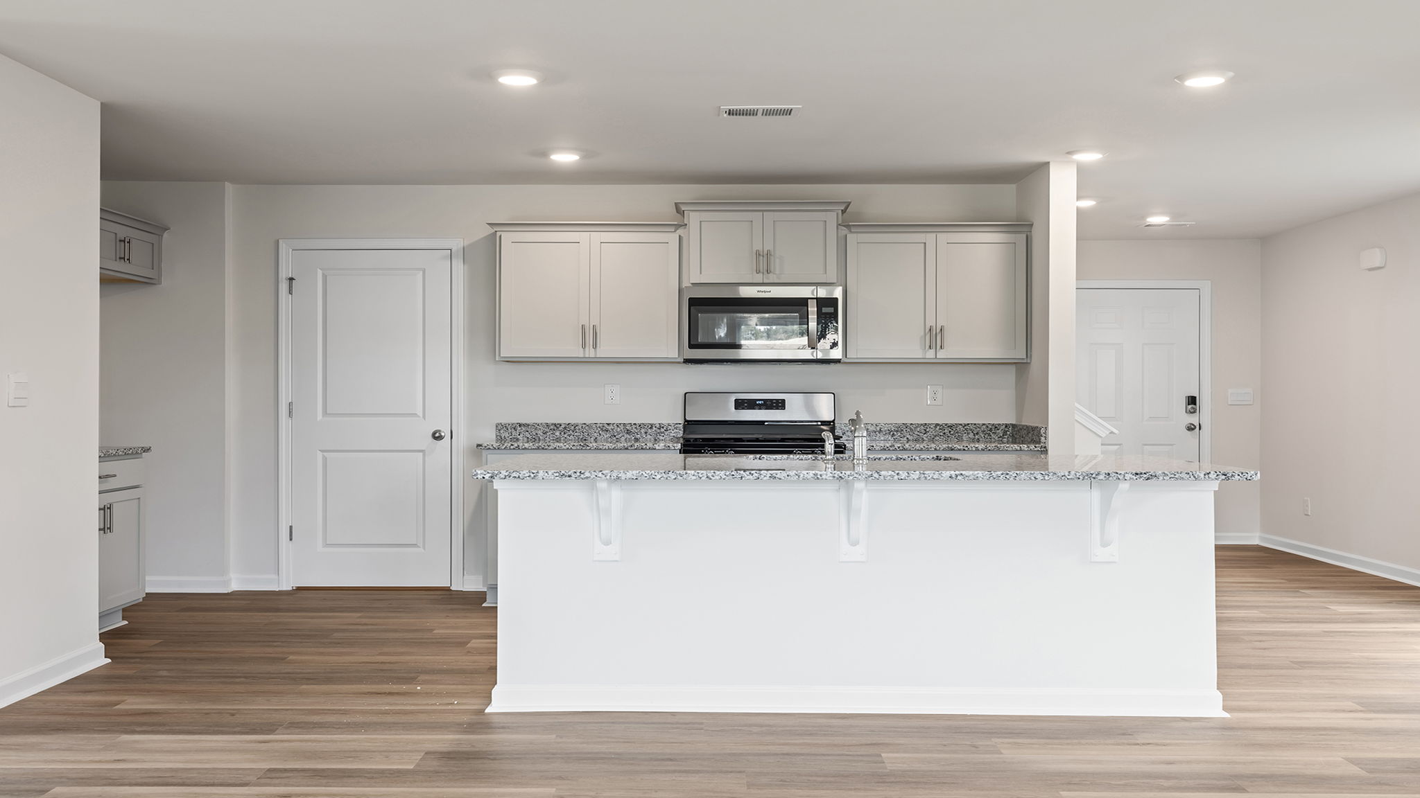 Kitchen island with quartz countertops.