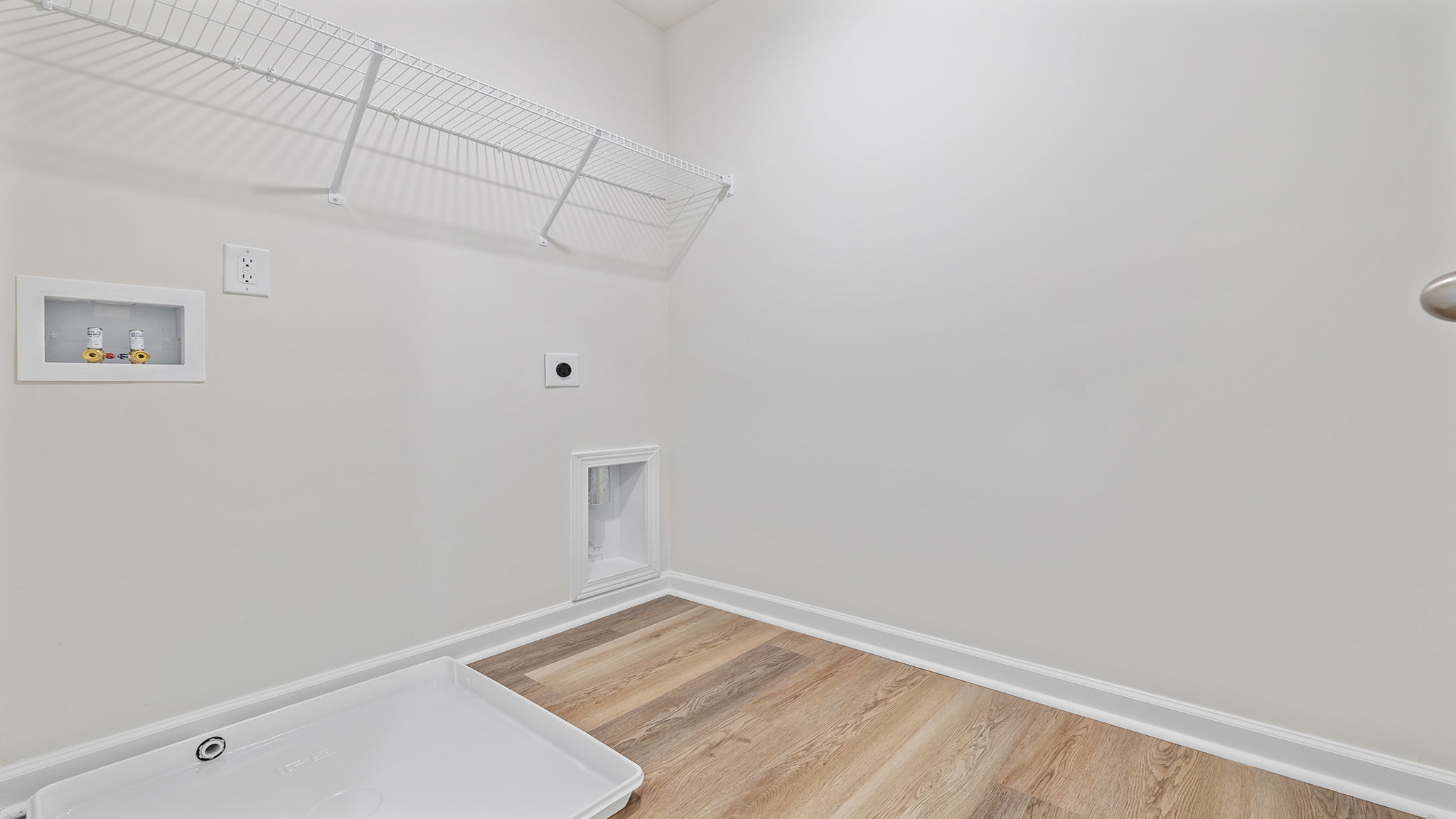 Walk-in laundry room.