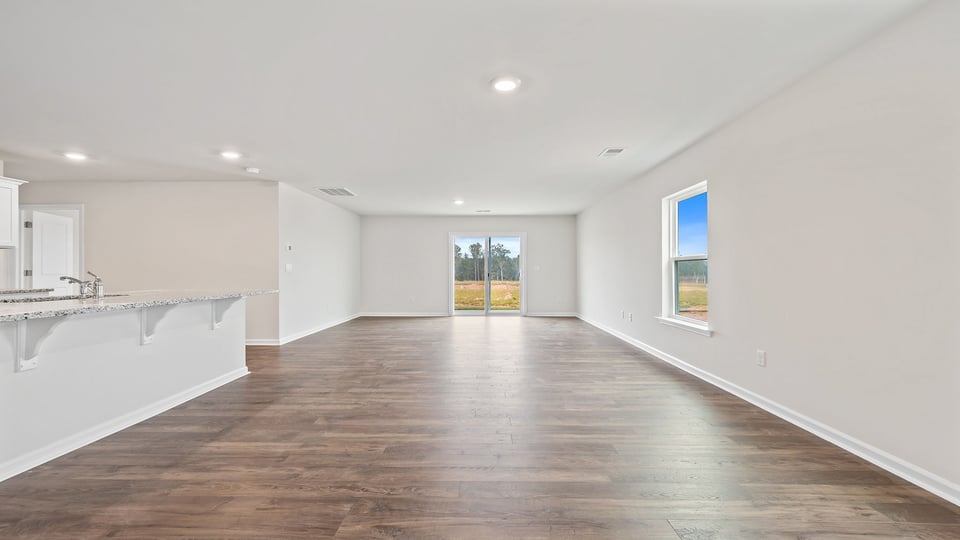 Family room with windows.