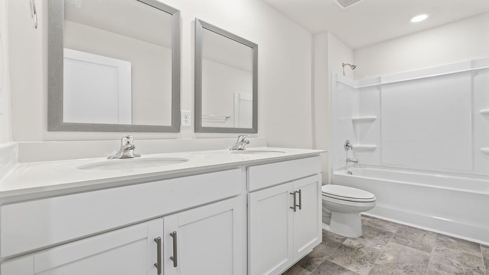 Bathroom with double vanity sink.