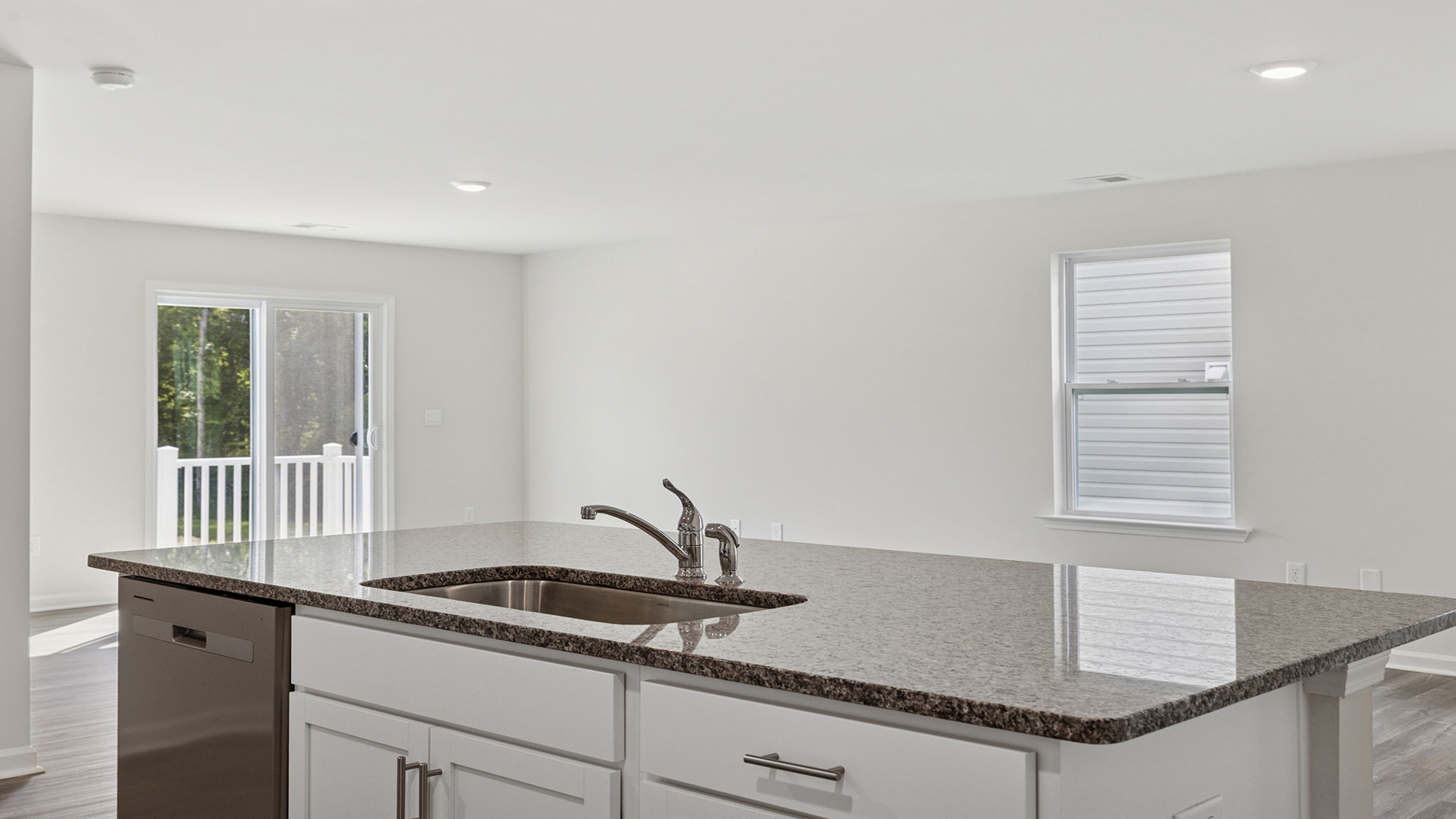 Island hosts the sink and dishwasher.