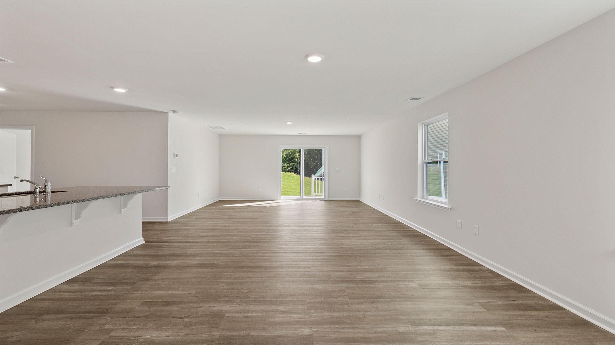 View of combination dining and living areas.