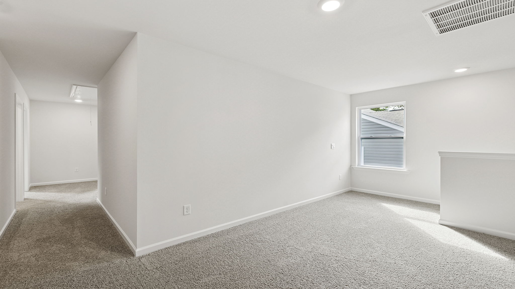 Upper level landing and loft area.