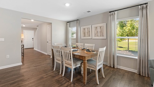 Kitchen and island with granite counter tops.