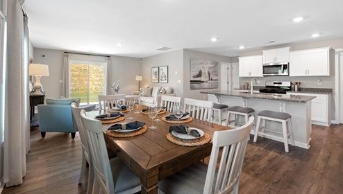 Kitchen and island with granite counter tops.