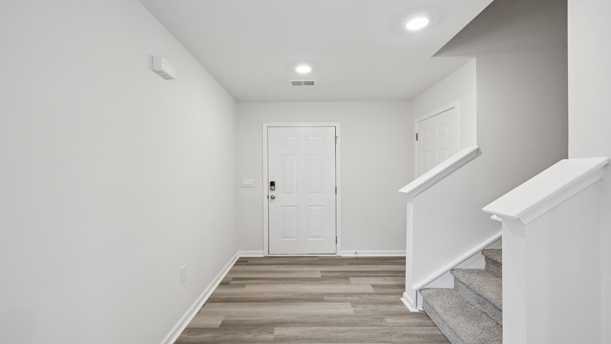 Entrance and stairwell to the upper level.