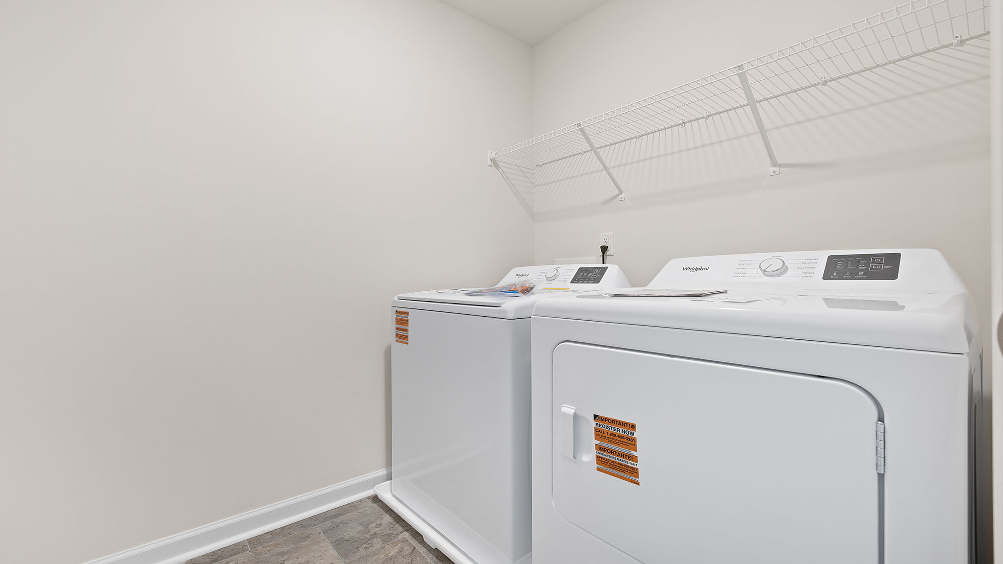 Laundry room with shelving.