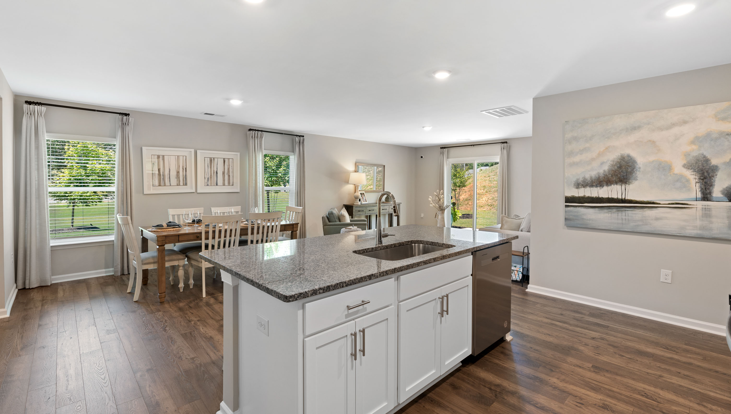 Kitchen with island and cabinets.