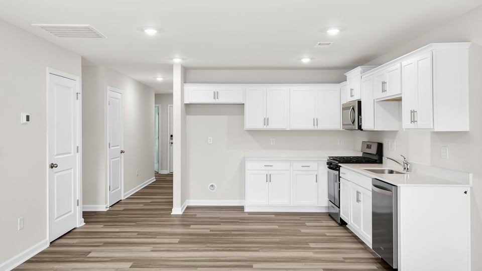 Kitchen with stainless steel appliances.