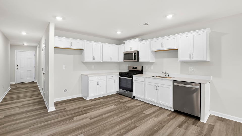 Kitchen with stainless steel appliances.