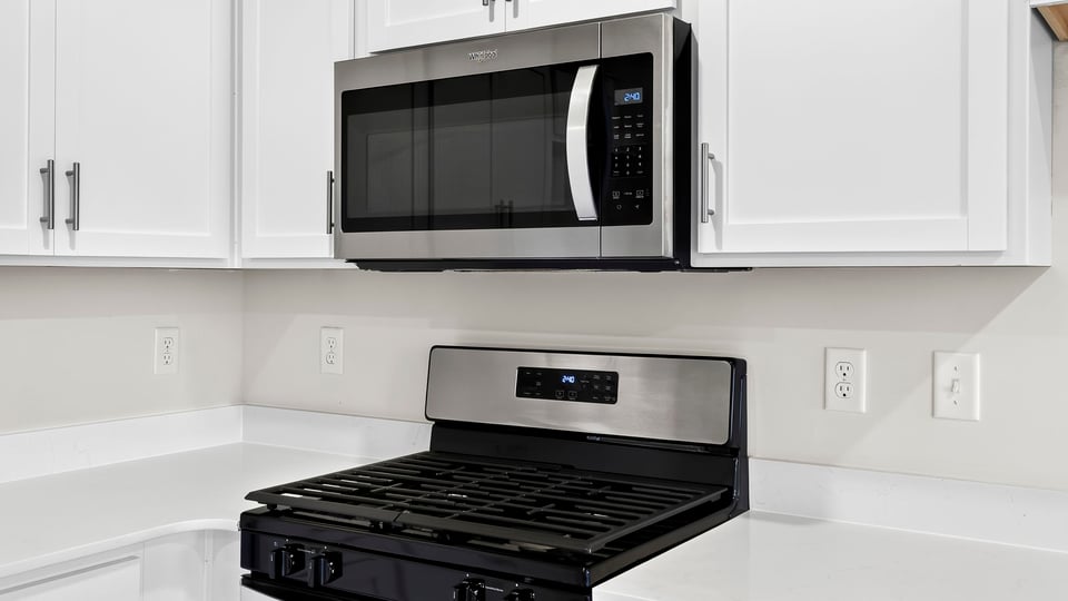 Kitchen with stainless steel appliances.
