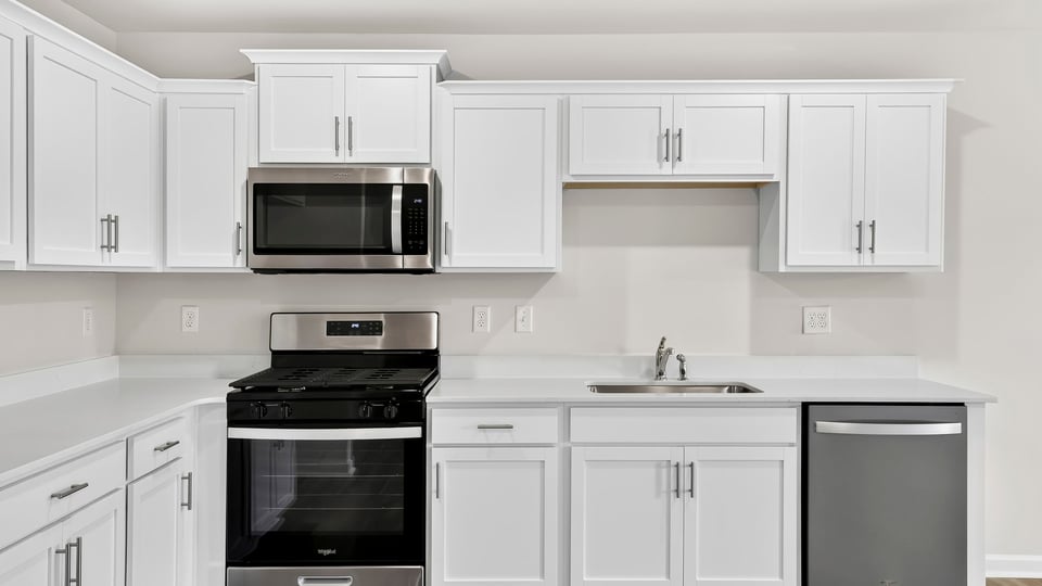Kitchen with stainless steel appliances.
