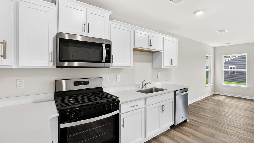 Kitchen with stainless steel appliances.