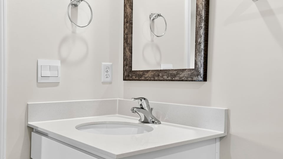 Bathroom with single vanity sink.