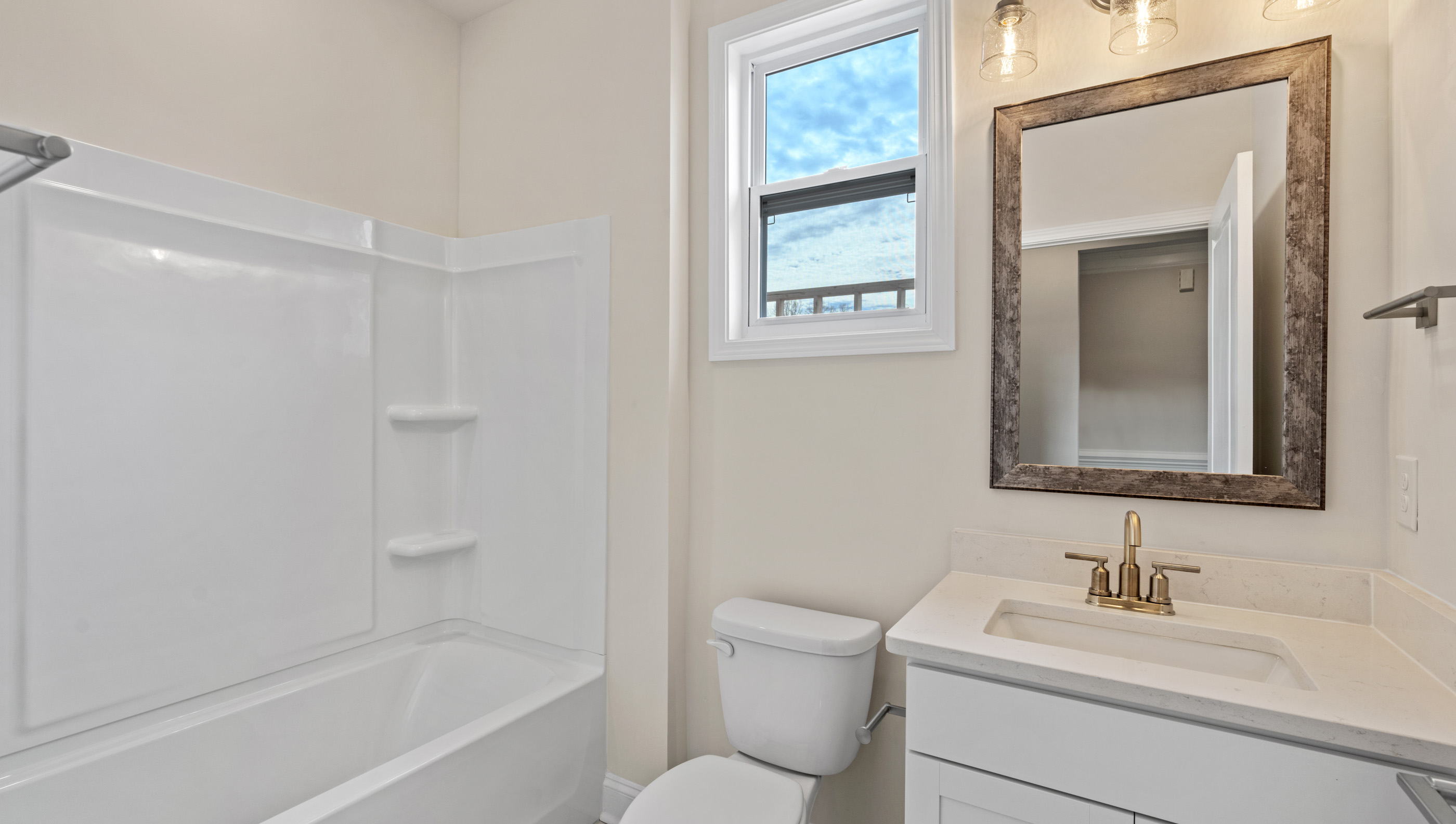 Bathroom with tub and vanity.