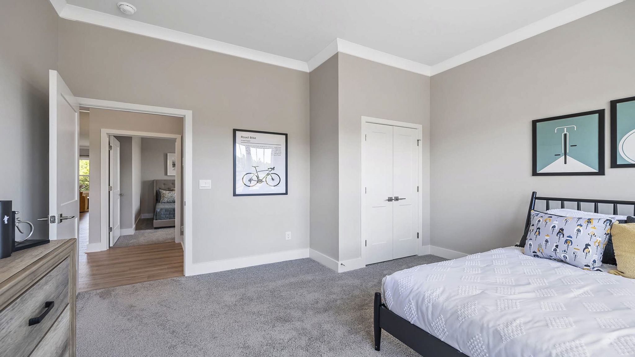 Bedroom with carpet and windows.