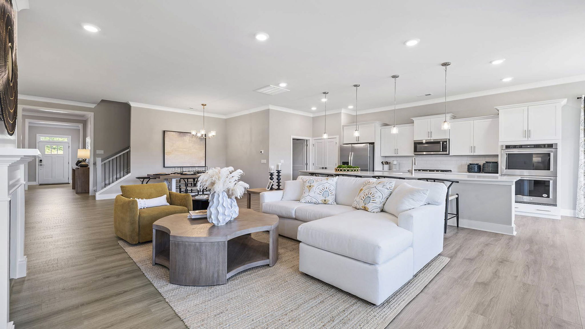 Living area with fireplace and windows.