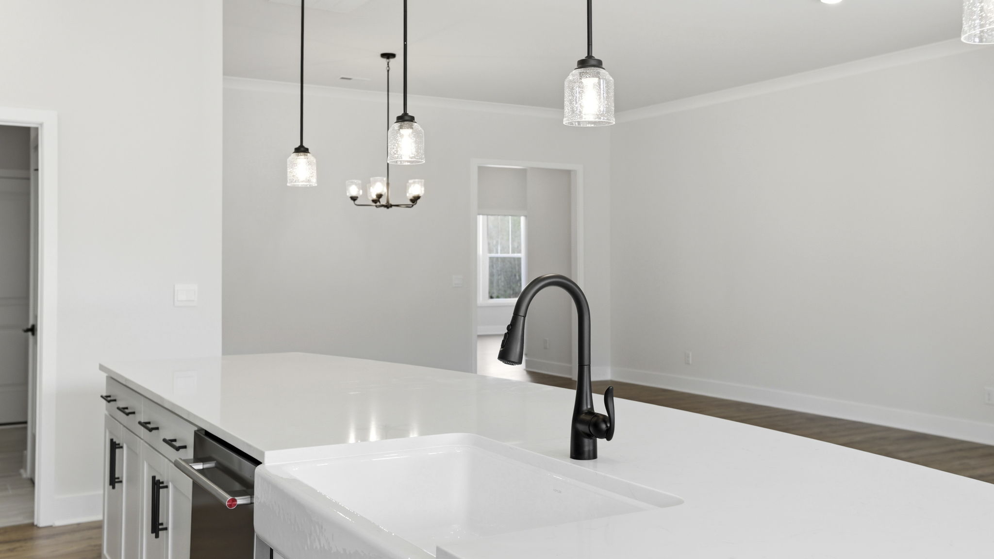 Island hosts the sink and dishwasher.