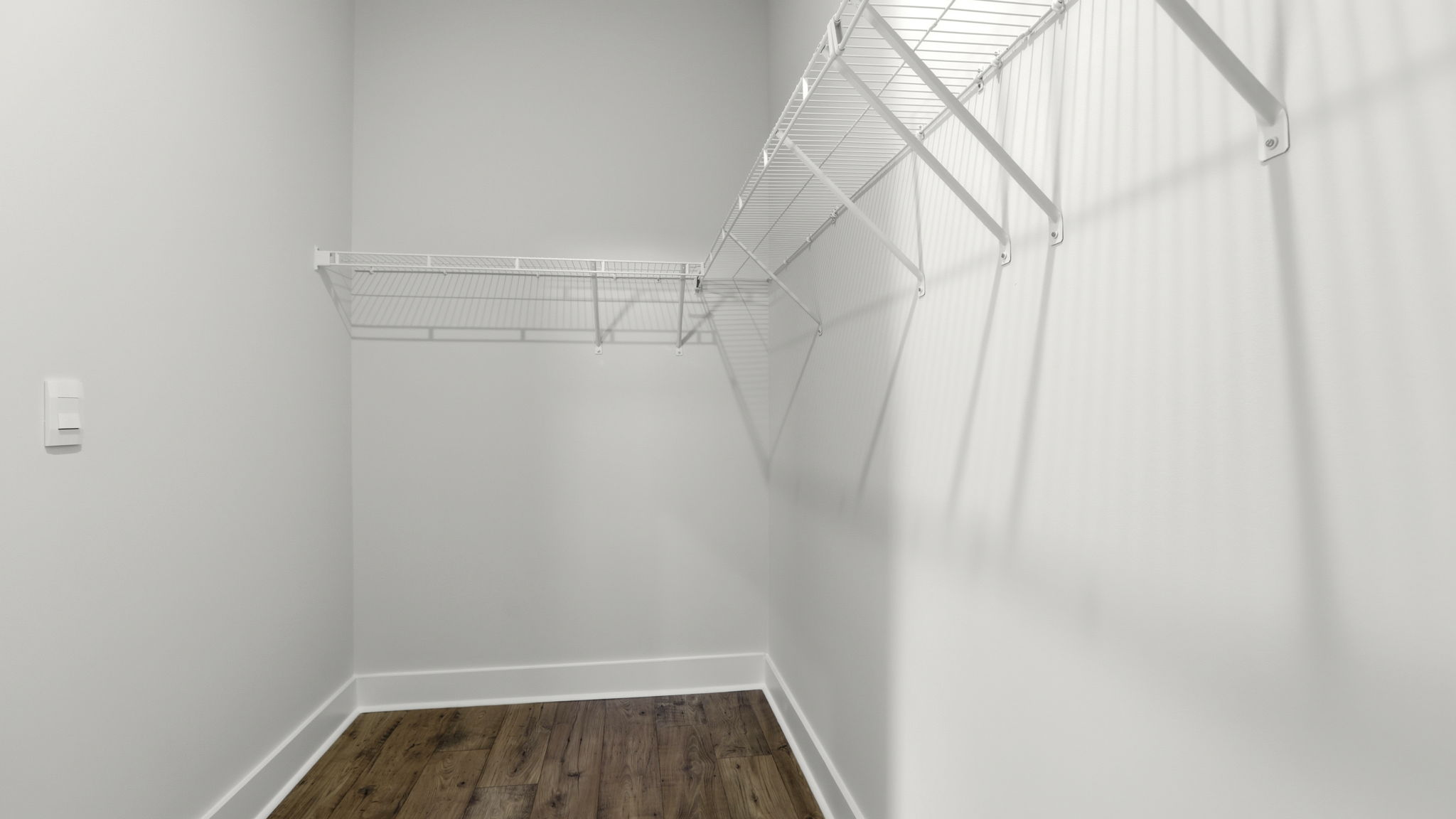 Primary bedroom walk-in closet.