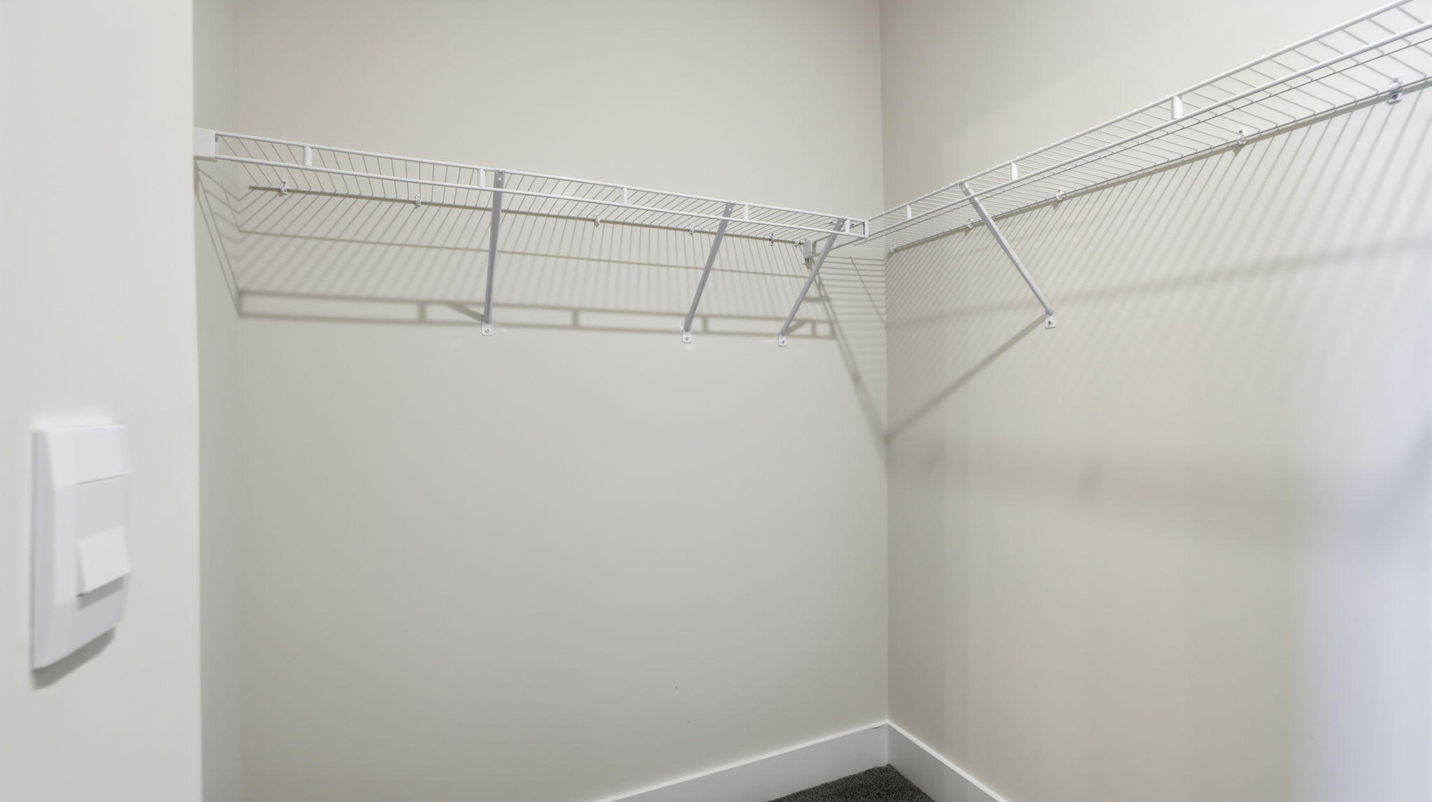 Primary bedroom walk-in closet.