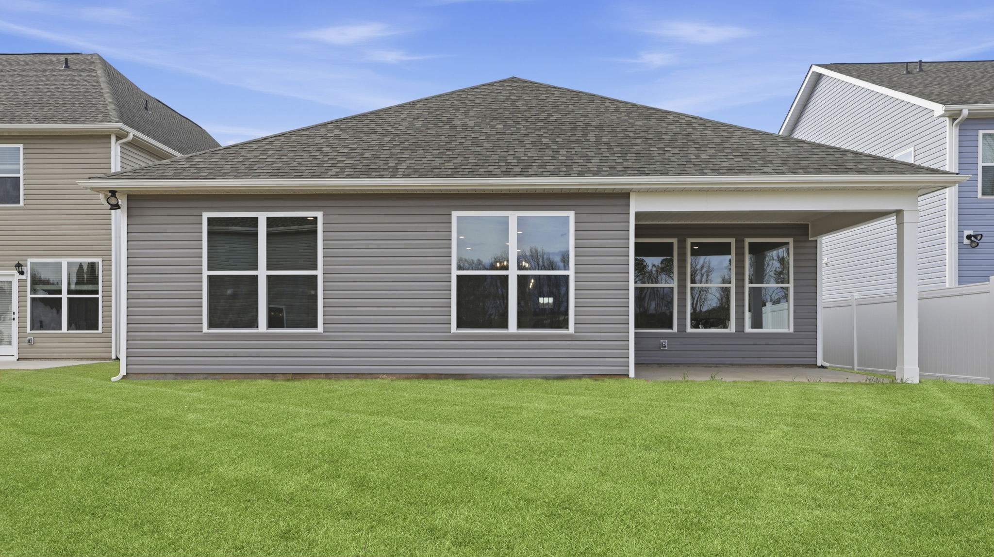 Back exterior view of the Robinson with covered porch.