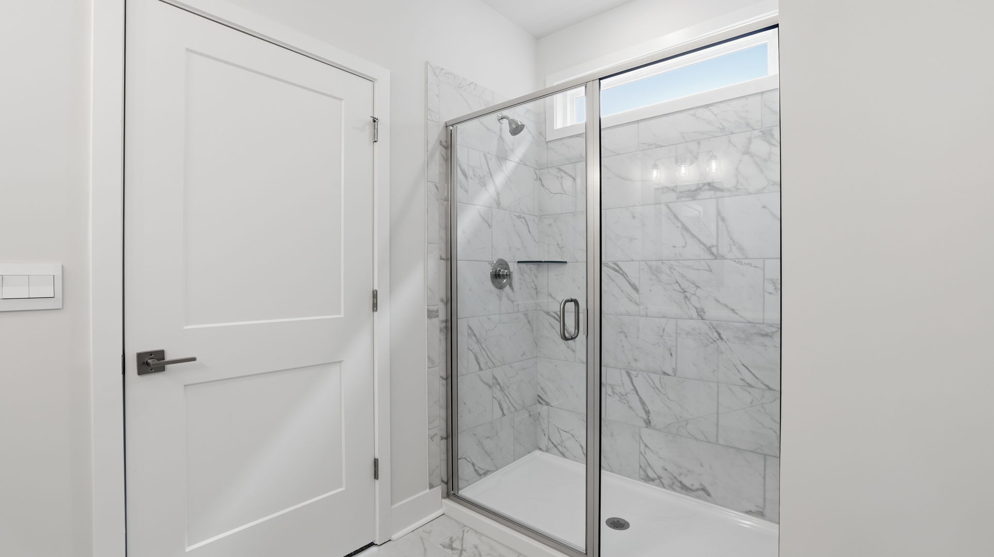 Primary bathroom walk-in closet.