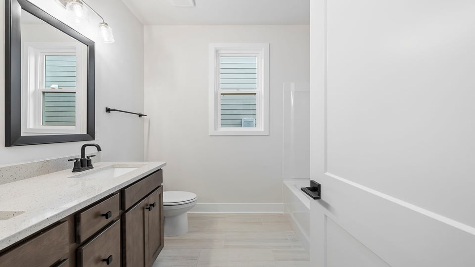 Bathroom with double vanity sinks.