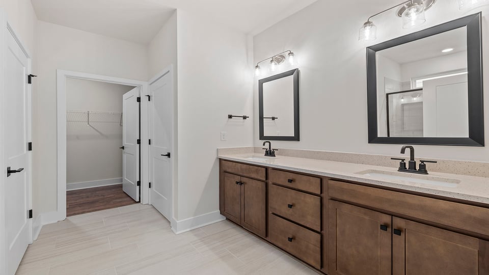 Primary bathroom with double vanity sink.