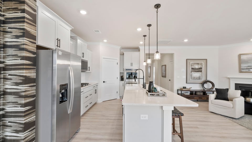 Kitchen with island and cabinets.